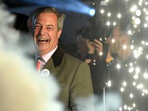 Brexit Party leader Nigel Farage smiles on stage in Parliament Square, venue for the Leave Means Leave Brexit Celebration as 11 O'Clock passes, in central London on January 31, 2020, the moment that the UK formally left the European Union. Brexit supporters gathered outside parliament on Friday to cheer Britain's departure from the European Union following three years of epic political drama -- but for others there were only tears. After 47 years in the European fold, the country leaves the EU at 11:00pm (2