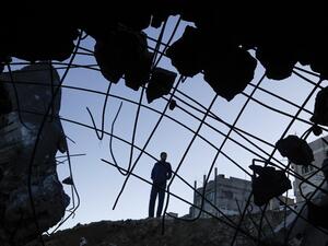 A Palestinian man inspects the site of an Israeli airstrike at Al-Shatee refugee camp in Gaza City February 6, 2020. Israeli aircraft struck Hamas positions in Gaza early Thursday, the military said, after Palestinians in the enclave again launched projectiles and explosive balloons at the Jewish state MOHAMMED ABED / AFP