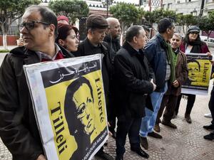 Supporters of Louisa Hanoune, head of Algeria's Workers' Party, gather for a demonstration in the city of Blida, about 45 kilometres southwest of the capital, on February 9, 2020, where Hanoune and Said Bouteflika, the jailed brother of the former president, are due to appear at a military tribunal. Sentenced in September to 15 years in prison for conspiring against the army and the state in Algeria, the 62-year-old brother and powerful advisor to ex-president Abdelaziz Bouteflika as well as two former inte
