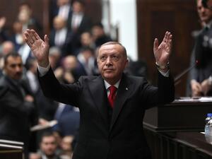 President of Turkey and leader of Justice and Development (AK) Party Recep Tayyip Erdogan waves as he attends the party's group meeting at Grand National Assembly of Turkey in Ankara, on February 12, 2020. Adem ALTAN / AFP
