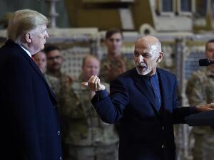 In this file photo taken on November 28, 2019 Afghan's President Ashraf Ghani addresses US troops during a surprise Thanksgiving day visit of US President Donald Trump at Bagram Air Field,in Afghanistan. AFP