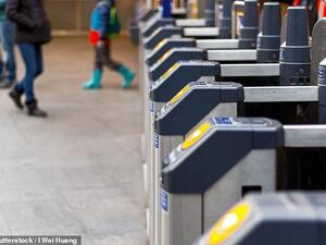 Technology being developed by payment giant Mastercard would allow travellers to pay simply by walking up to a turnstile (stock image/ Shutterstock)