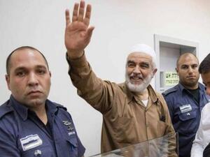 Arab Israeli cleric Sheikh Raed Salah, seen waving in this August 2017 picture. (AFP)