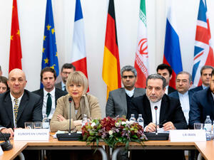 Iranian political deputy at the Ministry of Foreign Affairs of Iran Abbas Araghchi (C-R) and German Secretary General of the European External Action Service Helga Maria Schmid (C-L) attend a meeting of the Joint Commission on Iran's nuclear program. (JOE KLAMAR/AFP/GETTY IMAGES)