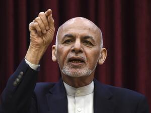 Afghan President Ashraf Ghani gestures as he speaks during a press conference at the presidential palace in Kabul on March 1, 2020. WAKIL KOHSAR / AFP