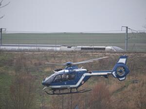 A Gendarmerie helicopter flies near the site where a high-speed TGV train locomotive derailed close to Ingenheim early on March 5, 2020 while travelling from the eastern city of Strasbourg to Paris. "The TGV locomotive went off the tracks near Ingenheim," around 30 kilometres (20 miles) northwest of Strasbourg, an SNCF spokeswoman said. 21 persons have been injured. Patrick HERTZOG / AFP