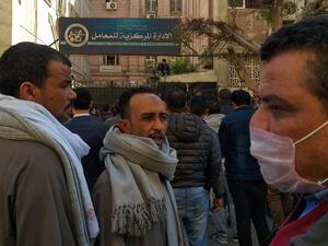 Egyptians bound for GCC countries gather in front of the Central Public Health Laboratories in downtown Cairo as they wait to get tested for coronavirus (COVID-19) on March 8, 2020. Khaled DESOUKI / AFP
