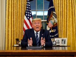 US President Donald Trump addresses the nation from the Oval Office about the widening Coronavirus crisis on March 11, 2020 in Washington, DC. President Trump said the US will suspend all travel from Europe - except the UK - for the next 30 days. Since December 2019, Coronavirus (COVID-19) has infected more than 109,000 people and killed more than 3,800 people in 105 countries. Doug Mills-Pool/Getty Images/AFP POOL / GETTY IMAGES NORTH AMERICA / AFP