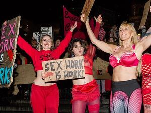 Exotic dancers perform in Piccadilly Circus in central London during a demonstration against discrimination of sex workers held on International Women's Day (DailyMail/W.Szymanowicz)