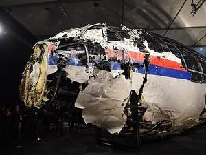 The destroyed cockpit of the plane on display in 2015. Evidence found that the plane was shot down by a BUK missile shot from Ukrainian from territory held by pro-Russia separatists (AFP)