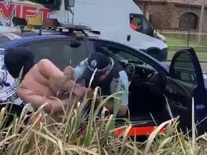 She was placed under arrest just after 5pm on Friday but resisted requests to get in the officer's car and spat in his face twice (Facebook)