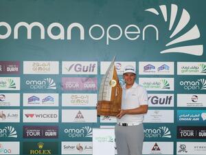 Valimaki with the Oman Open trophy