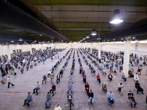 Expatriate returning from Egypt, Syria, and Lebanon arrive to be re-tested at a Kuwaiti health ministry containment and screening zone for COVID-19 coronavirus disease in Kuwait City on March 16, 2020. Facing a mounting public health threat, Saudi Arabia, the United Arab Emirates, Kuwait, Bahrain, Qatar and Oman have taken drastic measures to combat the pandemic. Kuwait has taken the strictest measures in the GCC by largely locking down the country over the weekend. YASSER AL-ZAYYAT / AFP
