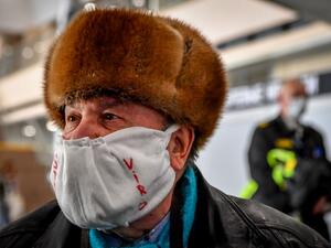 People gather at Moscow's Sheremetyevo airport terminal F for a repatriation flight to France for French and European nationals stuck in Russia because of the coronavirus crisis, April 4, 2020. Yuri KADOBNOV / AFP