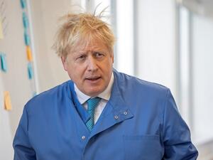 In this file photo taken on March 06, 2020 Britain's Prime Minister Boris Johnson visits to the Mologic Laboratory in the Bedford technology Park, north of London . Britain's Prime Minister Boris Johnson appeared to be on the road to recovery as Downing Street said the Prime Minister had returned to the ward at St Thomas' Hospital after spending three nights in the intensive care unit.  Jack Hill / POOL / AFP
