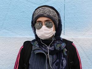 An Iranian woman wearing a protective mask poses for a picture in Tehran on April 13, 2020 during the coronavirus COVID-19 pandemic. The Islamic republic said on April 14 that the number of lives lost in the country to the novel coronavirus dropped to double figures for the first time in one month. Health ministry spokesman Kianoush Jahanpour said 98 deaths from the COVID-19 disease were recorded in the past 24 hours, bringing the overall toll to 4,683.  ATTA KENARE / AFP An Iranian woman wearing a protective mask poses for a picture in Tehran on April 13, 2020 during the coronavirus COVID-19 pandemic. The Islamic republic said on April 14 that the number of lives lost in the country to the novel coronavirus dropped to double figures for the first time in one month. Health ministry spokesman Kianoush Jahanpour said 98 deaths from the COVID-19 disease were recorded in the past 24 hours, bringing the overall toll to 4,683.  ATTA KENARE / AFP