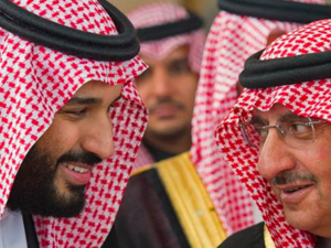 A file photo showing Mohammed bin Salman (L) and Mohammed bin Nayef (R) [Bandar al-Jaloud/Saudi Royal Palace/AFP]
