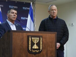 In this file photo taken on February 24, 2020, leader of Israel's Blue and White electoral alliance Benny Gantz (R) listens to Gabi Ashkenazi (L), member of the Blue and White electoral alliance, as he speaks during a press conference in the southern Israeli town of Sderot on the border with Gaza. Former Israeli army chief Gabi Ashkenazi, who spent nearly four decades in the military, will be nominated as Israel's next foreign minister, his Blue and White political alliance said on May 13. Jack GUEZ / AFP