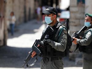Member of the Israeli security forces patrol in the area where Israeli police in annexed east Jerusalem reportedly shot dead a Palestinian with special needs they mistakenly thought was armed with a pistol, on May 30, 2020. The incident happened in the alleys of the walled Old City near Lions' Gate, an access point mainly used by Palestinians. Ahmad GHARABLI / AFP