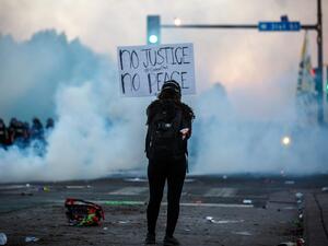 Clashes broke out and major cities imposed curfews as America began another night of unrest Saturday with angry demonstrators ignoring warnings from President Donald Trump that his government would stop violent protests over police brutality "cold." Kerem Yucel / AFP