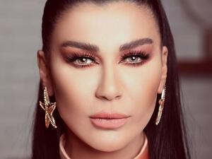 نادين الراسي تستقبل الصيف بالبكيني وفي أحضان خطيبها!