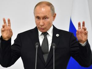 Conspiracy theories have long circulated suggesting that Putin had died and been replaced by a lookalike | © POOL/AFP/File | Yuri KADOBNOV