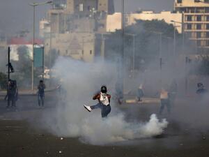 A Lebanese protester kicks a tear gas canister amid clashes with riot police following a demonstration in central Beirut, on June 6, 2020. Protesters poured into the streets of the Lebanese capital to decry the collapse of the economy, as clashes erupted between supporters and opponents of the Iran-backed Shiite group Hezbollah. PATRICK BAZ / AFP A Lebanese protester kicks a tear gas canister amid clashes with riot police following a demonstration in central Beirut, on June 6, 2020. Protesters poured into the streets of the Lebanese capital to decry the collapse of the economy, as clashes erupted between supporters and opponents of the Iran-backed Shiite group Hezbollah. PATRICK BAZ / AFP