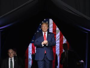 In this file photo taken on February 19, 2020 US President Donald Trump arrives to deliver remarks at a Keep America Great rally in Phoenix, Arizona. Donald Trump has postponed a controversial rally scheduled for the same day as a holiday commemorating the end of slavery in the US, following fierce criticism, he announced June 12. The "Make America Great Again" rally in Tulsa, Oklahoma had been due to mark Trump's return to the campaign trail, but he said on Twitter the event had been postponed "out of resp