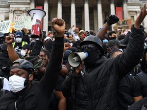 Protesters gather in support of the Black Lives Matter movement for a protest action in Trafalgar Sqaure in central London on June 13, 2020, in the aftermath of the death of unarmed black man George Floyd in police custody in the US. Police in London have urged people planning to attend anti-racism and counter protests on Saturday not to turn out, citing government regulations banning gatherings during the coronavirus pandemic. DANIEL LEAL-OLIVAS / AFP Protesters gather in support of the Black Lives Matter movement for a protest action in Trafalgar Sqaure in central London on June 13, 2020, in the aftermath of the death of unarmed black man George Floyd in police custody in the US. Police in London have urged people planning to attend anti-racism and counter protests on Saturday not to turn out, citing government regulations banning gatherings during the coronavirus pandemic. DANIEL LEAL-OLIVAS / AFP