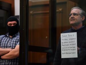 Paul Whelan, a former US marine accused of espionage and arrested in Russia in December 2018, stands inside a defendants' cage as he waits to hear his verdict in Moscow on June 15, 2020. Kirill KUDRYAVTSEV / AFP