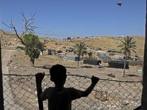 A Palestinian child stands at his family land east of Tubas in the Jordan Valley on June 15, 2020. Israel intends to annex West Bank settlements and the Jordan Valley, as proposed by US President Donald Trump, with initial steps slated to begin from July 1.  JAAFAR ASHTIYEH / AFP