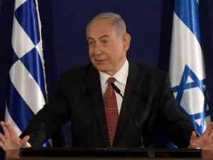 Israeli Prime Minister Benjamin Netanyahu delivers a press statement alongside his Greek counterpart in Jerusalem on June 16, 2020. DEBBIE HILL / POOL / AFP