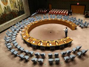 In this file photo taken on September 20, 2017 an official looks at the empty chairs of leaders ahead of their participation in an open debate of the United Nations Security Council in New York. The UN General Assembly on June 17, 2020 will elect five new members of the Security Council for 2021 and 2022, with battles underway for the Western and African seats. Stephane LEMOUTON / POOL / AFP