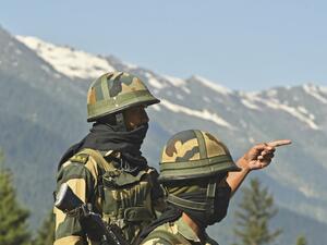 Indian Border Security Force (BSF) soldiers guard a highway leading towards Leh, bordering China, in Gagangir on June 17, 2020. India is sending hundreds of extra troops towards the Chinese border, sources told AFP on June 17, after the deadliest clashes in over 50 years between the two Asian giants left 20 Indian soldiers dead following brawls with fists, rocks and clubs. Tauseef MUSTAFA / AFP