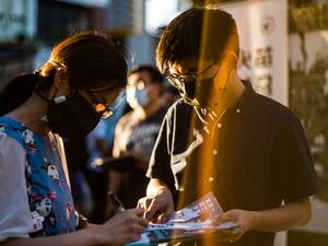 Pro-democracy activist Joshua Wong (R) stands next to a supporter after he announced his plan to run for the upcoming Legislative Council elections in Hong Kong on June 19, 2020. Anthony WALLACE / AFP Pro-democracy activist Joshua Wong (R) stands next to a supporter after he announced his plan to run for the upcoming Legislative Council elections in Hong Kong on June 19, 2020. Anthony WALLACE / AFP