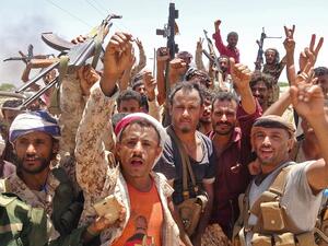 In this file photo taken on May 11, 2020, fighters from of the Southern Transitional Council (STC) gesture following clashes with Saudi-backed government forces in the Sheikh Salim area in the southern Abyan province. On top of war and the coronavirus pandemic, Yemen faces looming economic disaster as a crisis gripping its main benefactor Saudi Arabia dents remittances and leaves state coffers running dry. Nabil HASAN / AFP In this file photo taken on May 11, 2020, fighters from of the Southern Transitional Council (STC) gesture following clashes with Saudi-backed government forces in the Sheikh Salim area in the southern Abyan province. On top of war and the coronavirus pandemic, Yemen faces looming economic disaster as a crisis gripping its main benefactor Saudi Arabia dents remittances and leaves state coffers running dry. Nabil HASAN / AFP
