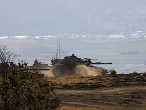 An Israeli army Merkava Mark IV tank takes part in a military drill in the Israeli-annexed Golan Heights on June 24, 2020. JALAA MAREY / AFP
