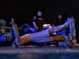 A statue of Confederate States president Jefferson Davis lies on the street after protesters pulled it down in Richmond, Virginia, on June 10, 2020. (AFP)