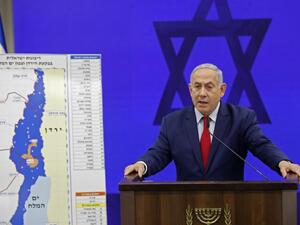 Israeli Prime Minister Benjamin Netanyahu speaks in Ramat Gan about his pledge to annex the Jordan Valley on 10 September (AFP)