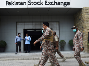 Paramilitary officers inspect the premisses of the Pakistan Stock Exchange building following an attack by gunmen in Karachi on June 29, 2020. Rizwan TABASSUM / AFP