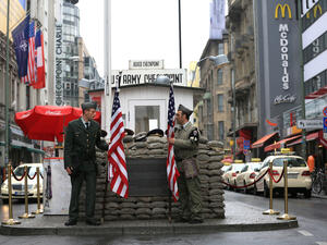 Checkpoint Charlie was the name given by the Western Allies to the best-known Berlin Wall crossing point between East Berlin and West Berlin during the Cold War.  B