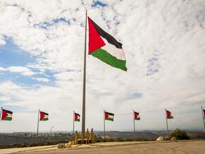  A row of Palestine flags on the top of the hill in Rawabi (Shutterstock)