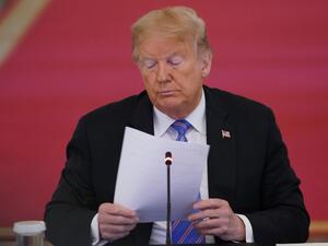 In this file photo taken on June 26, 2020 US President Donald Trump looks on during an American Workforce Policy Advisory Board Meeting in the East Room of the White House in Washington, DC. Donald Trump received a written briefing about alleged Russian bounties offered to Afghan militants to kill American troops as early as February, The New York Times said on June 29, 2020 in a new report undercutting the US president's assertion that he was not told of the threat. MANDEL NGAN / AFP In this file photo taken on June 26, 2020 US President Donald Trump looks on during an American Workforce Policy Advisory Board Meeting in the East Room of the White House in Washington, DC. Donald Trump received a written briefing about alleged Russian bounties offered to Afghan militants to kill American troops as early as February, The New York Times said on June 29, 2020 in a new report undercutting the US president's assertion that he was not told of the threat. MANDEL NGAN / AFP