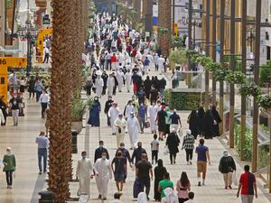 Kuwaitis wearing face masks walk inside the re-opened Avenues Mall, the country's largest shopping centre, on June 30, 2020 in Kuwait City after almost a four-months shutdown to prevent the spread of the coronavirus COVID-19 in the country. YASSER AL-ZAYYAT / AFP