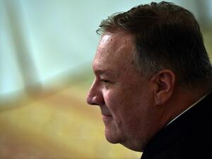 In this file photo taken on May 19, 2020 US Secretary of State Mike Pompeo looks on as President Donald Trump meets with his cabinet in the Cabinet Room of the White House in Washington, DC. The US Congress on July 2, 2020 passed tough new sanctions that target banks over violations of Hong Kong's autonomy, dialing up the pressure on China over the harsh security law it imposed on the financial hub. Brendan Smialowski / AFP