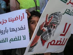 Palestinian supporters of Hamas attend a rally against Israel's West Bank annexation plans, in Rafah in the southern Gaza Strip on July 3, 2020. Rival Palestinian factions Fatah and Hamas pledged unity against Israel's West Bank annexation plans in a rare joint conference earlier in the week, as signs emerged of a rift between Israel and Washington over the project. SAID KHATIB / AFP
