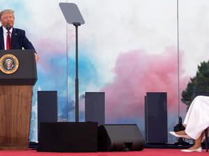 US President Donald Trump speaks as First Lady Melania Trump listens during the 2020 "Salute to America" event in honor of Independence Day on the South Lawn of the White House in Washington, DC, July 4, 2020. SAUL LOEB / AFP
