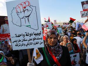Supporters of Libyan military strongman Khalifa Haftar take part in a gathering in the eastern Libyan port city of Benghazi on July 5, 2020, to protest against Turkish intervention in the country's affairs. Abdullah DOMA / AFP