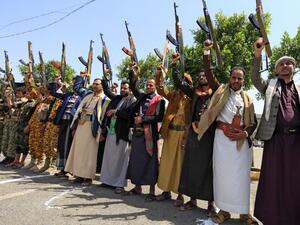 Yemeni gunmen loyal to the Huthi movement brandish their weapons during a rally in the capital Sanaa, to show support to the movement against the Saudi-led intervention in the country on July, 7, 2020. Mohammed HUWAIS / AFP