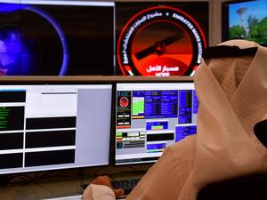 In this file photo taken on July 05, 2020 an employee works at the control room of the Mars Mission at the Mohammed Bin Rashid Space Centre (MBRSC), in the Gulf emirate of Dubai. GIUSEPPE CACACE / AFP